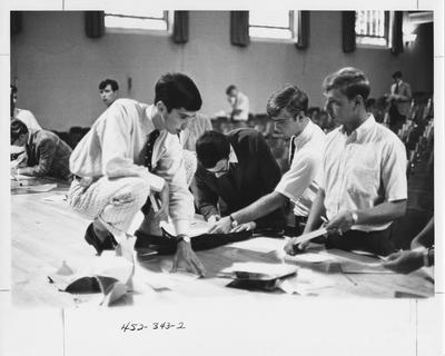 Various Greek students. This photo appears second on page 343 in the 1969 Kentuckian