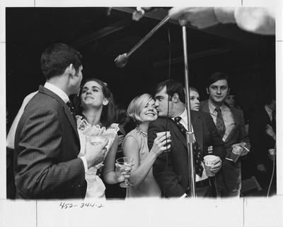 Couples dancing at a fraternity party. This photo appears second on page 344 in the 1969 Kentuckian
