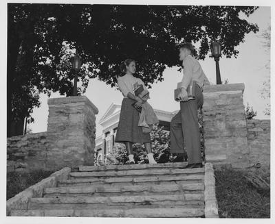 Susan Haselden (right) is talking to an unidentified man