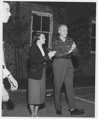 Margaret Futrell (left) and Dick Vimont (right) are talking outside