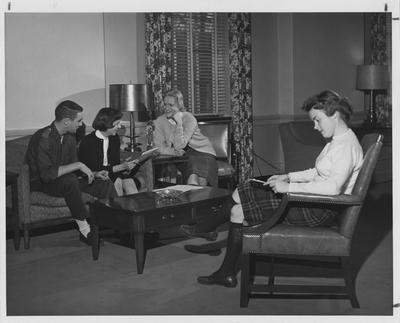 Four students in lobby of Patterson Hall