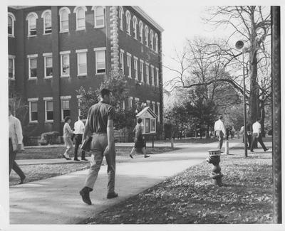 Students walking between classes. Received December 11, 1961 from Public Relations