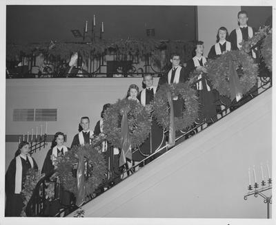 Student Union members standing on staircase in Student Center during holiday season. Received December 4, 1956 from Public Relations