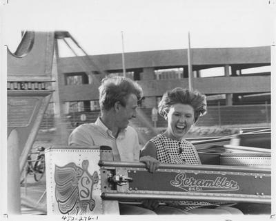 Two unidentified students on a carnival ride at the Little Kentucky Derby. This photo appears first on page 276 in the 1969 Kentuckian