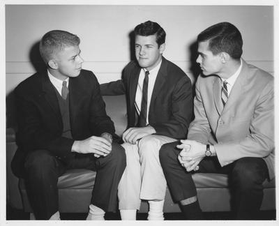 Three unidentified men sitting at the UK Forum. Received December 19, 1963 from Public Relations