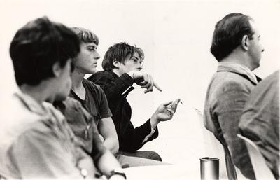 Five unidentified people, one is speaking at a Community Alliance for Responsible Action (C.A.R.S.A) meeting. This image appears first on page 255 in the 1969 Kentuckian