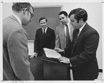 Executive Committee; including (from left to right): Dean Stewart Minton, Darryl Smith, Ellis Bullock, and Larry Baumgardner (chairman). This image appears first on page 362 in the 1969 Kentuckian