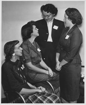 Four unidentified female members of the UK Newcomers Club. Photographer: Herald-Leader. Received October 20, 1959 from Public Relations