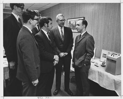 Tau Beta Pi officers; This image is in the 1969 Kentuckian on page 371, image 1; Left to right: Robert Pantle, cataloger, Dana Ladd, corresponding secretary, Jerry Barnes, treasurer, Larry Steel, vice - president, Robert Nagle, secretary - treasurer (national office), Phillip Camill, president