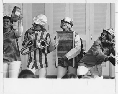 Sorority sisters acting out a skit; This image is in the 1969 Kentuckian on page 54, image 1