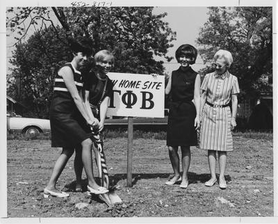 Gamma Phi Beta sisters break ground fro a new home site; This image is in the 1969 Kentuckian on page 317, image 1