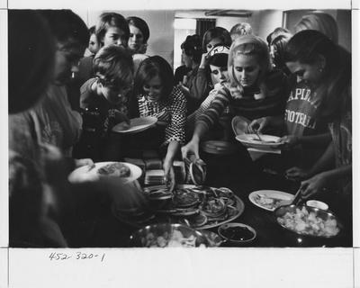 Kappa Delta snack time; This image is in the 1969 Kentuckian on page 320, image 33