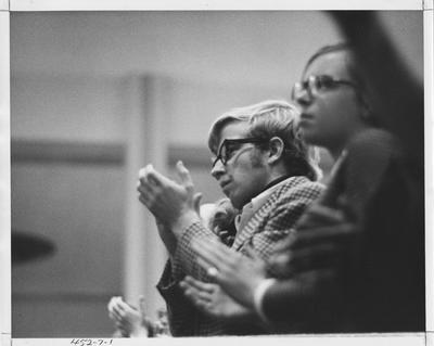 Students clapping at a speech by Julian Bond; This photo is in the 1969 Kentuckian page 7, image number 1