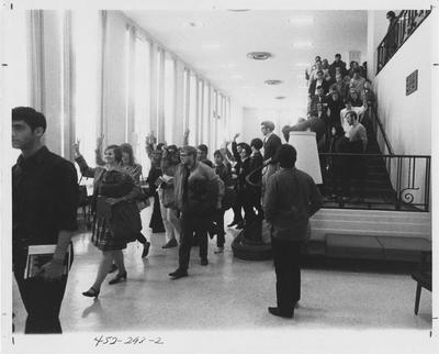 Students leave the Student Center during a protest; This image is in the 1969 Kentuckian on page 293, image 2