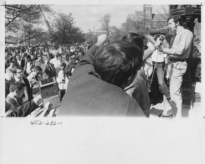 Student Guy Mendes speaks at a protest near the Administration Building; This image is in the 1969 Kentuckian on page 282, image 1