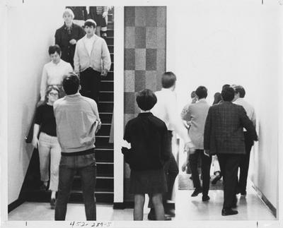 Students walking in halls; This image is in the 1969 Kentuckian on page 289, image 5
