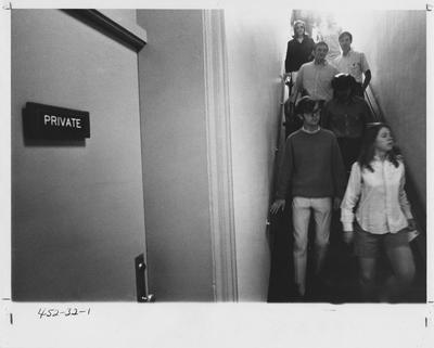 Students descending a staircase; This image is in the 1969 Kentuckian on page 32, image 1