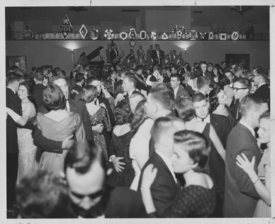 Greek Week Dance in the Student Union Building; This photo is in the 1958 Kentuckian on page 1, image number 4 and on page 103, image number 1