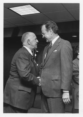 Then United States Vice - President George H. W. Bush talks with former Governor A. B. 