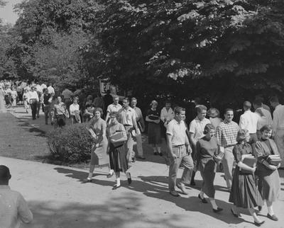 Students walking past the North side of the Administration Building