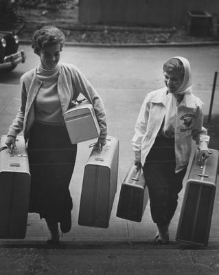 Two women moving into Patterson Hall