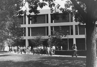 Students walk past the White Hall Classroom Building