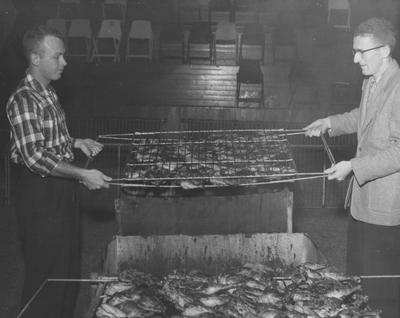 Members of the Poultry Club preparing barbecue chicken