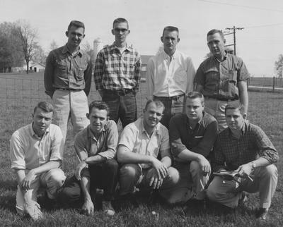 1958 - 1959 Livestock Judging Team; Front Row (left to right): Bud Greedy, Randall Wood, Charles Watson, unidentified, Maurice Ham; Back Row (left to right): Joe McCarty, Doug Henshaw, David Wynn, Professor Robert Hicks