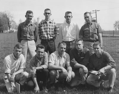 1958 - 1959 Livestock Judging Team; Front Row (left to right): Bud Greedy, Randall Wood, Charles Watson, unidentified, Maurice Ham; Back Row (left to right): Joe McCarty, Doug Henshaw, David Wynn, Professor Robert Hicks
