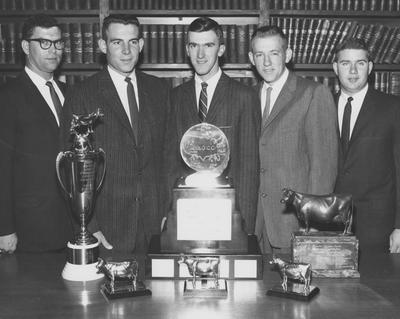 Dairy team with trophies; Glen Goebee on right