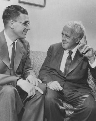 Two men having a discussion; Received from Professor William S. Ward