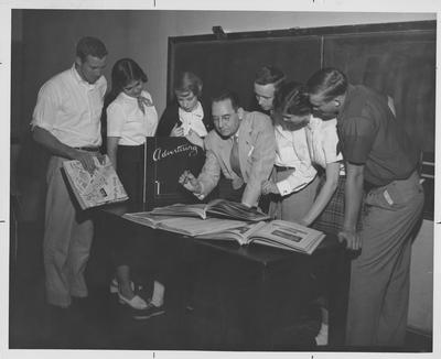 Commerce Advertising; Professor R. D. McIntyre (center)