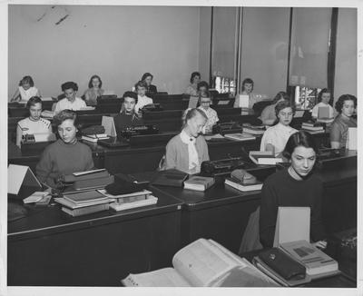 Women in a typing class; Willa Tussey, left front