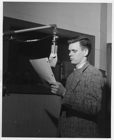 A student working at WUKY student radio station