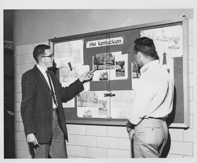 Ed Clements shows off a display of the 1961 Kentuckian
