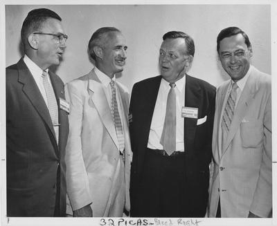 From left to right: Dr. Lyman Ginger, unidentified, Tom Ballantine, President Davidson, University of Louisville; Lexington Herald - Leader