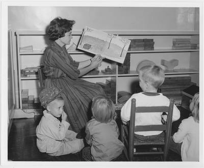 Children listening to a story being read
