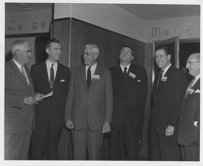 From left to right: Dean Terrell of the College of Engineering, President Dickey, N. M. Beking of General Electric, Dean Ernst of Speed Scientific School of Louisville, rest unidentified