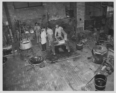 Men in a machine shop