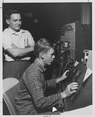 Men in the University of Kentucky Electrical Engineering lab; This image is on page 259 of the Kentuckian