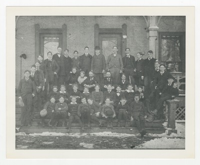 Young men gathered on steps