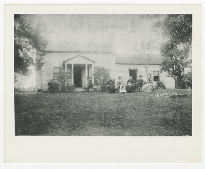 The Foley family in front of their early home in the South Elkhorn neighborhood on Higbee Mill road