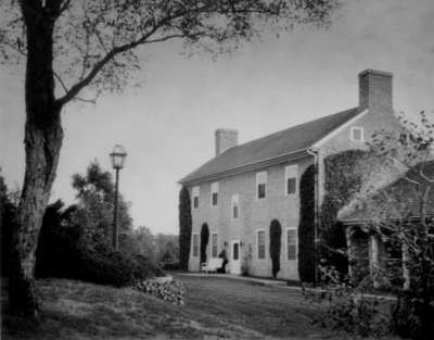 Large, three-story stone home