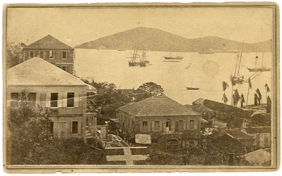 House overlooking a bay; handwritten note on back: 