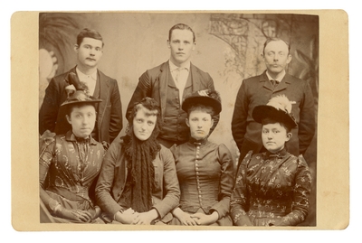 Group portrait of four women and three men, all unidentified