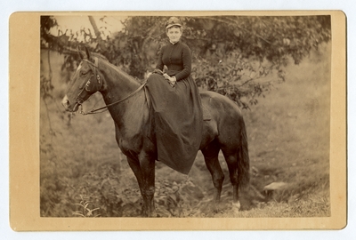 Portrait of an unidentified woman on horseback