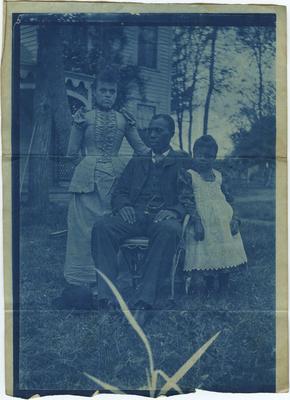 Unidentified African American female, male, and child; same female in item 5