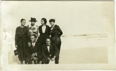 Unidentified group photo of four African American females and two African American males on the beach