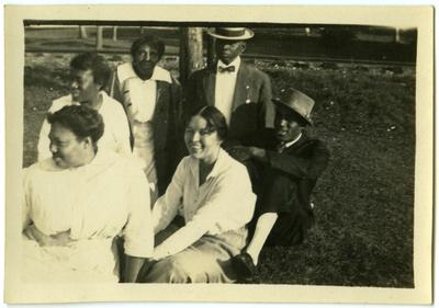 Four unidentified African American females and two unidentified African American males