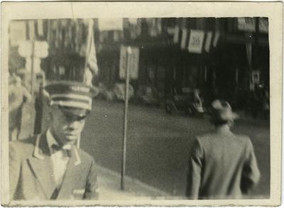 Unidentified African American male wearing a porter uniform